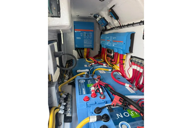  Yacht Photos Pics Electrical system of 2026 Mag Bay 43 CC boat, featuring batteries and wiring.
