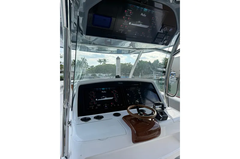  Yacht Photos Pics 2026 Mag Bay 43 CC boat helm with advanced navigation displays and controls.
