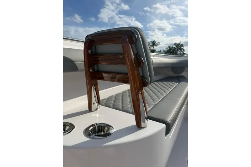  Yacht Photos Pics Luxury seating on 2026 Mag Bay 43 CC boat with elegant wood and leather design.