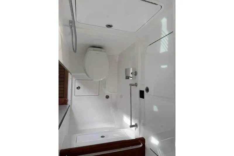  Yacht Photos Pics 2026 Mag Bay 43 CC boat bathroom interior with modern fixtures and sleek design.