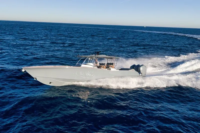  Yacht Photos Pics 2026 Mag Bay 43 CC cruising on open ocean waters.