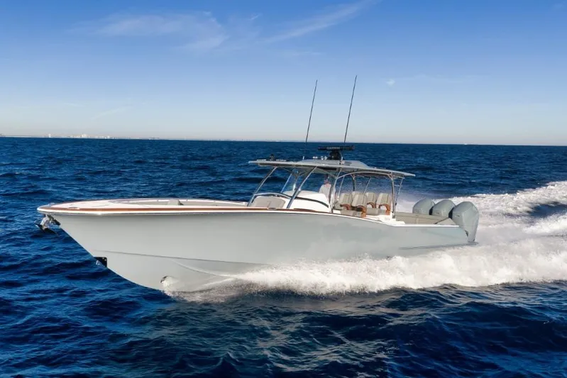  Yacht Photos Pics 2026 Mag Bay 43 CC boat cruising on open ocean waters.