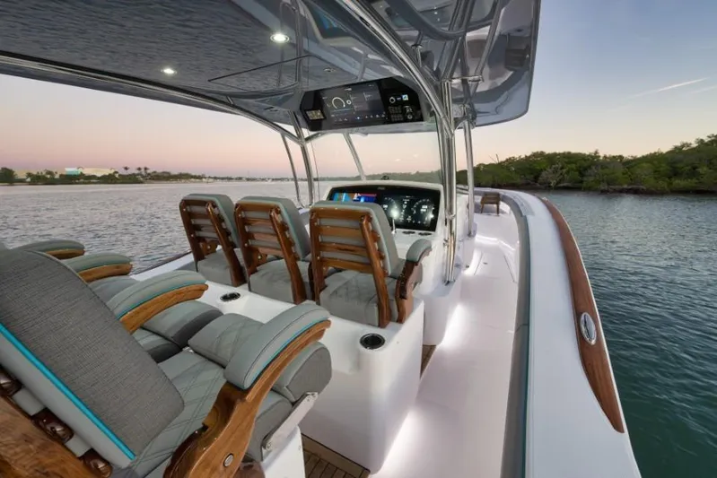  Yacht Photos Pics Luxurious 2026 Mag Bay 43 CC boat interior with elegant seating and advanced navigation system.