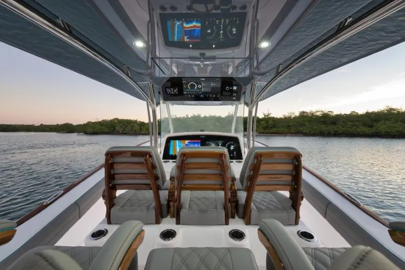  Yacht Photos Pics Interior view of 2026 Mag Bay 43 CC boat with advanced navigation displays.