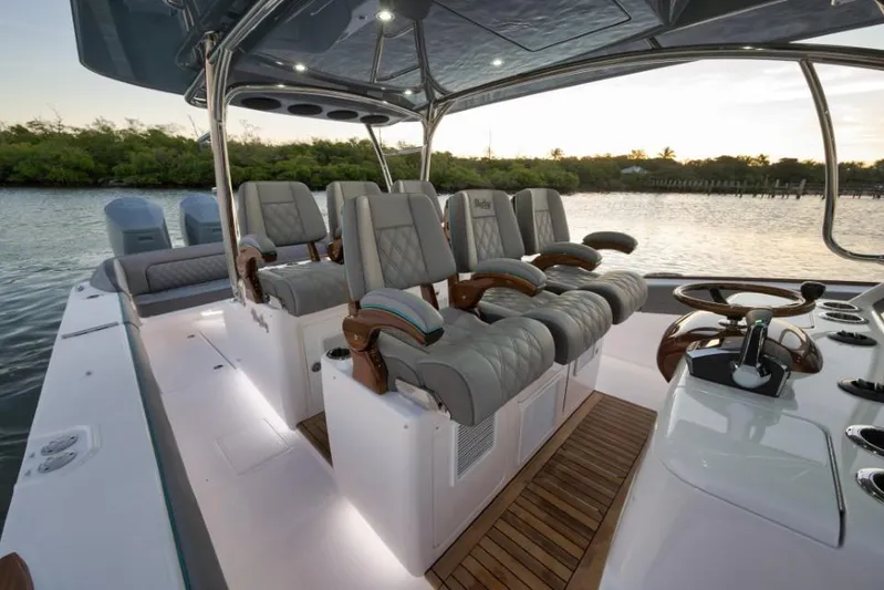  Yacht Photos Pics Luxurious interior of 2026 Mag Bay 43 CC boat with plush seating and modern controls.