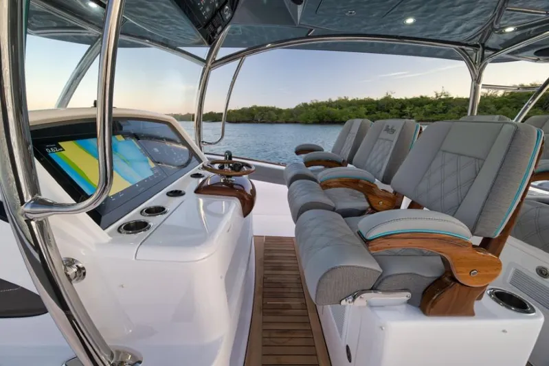  Yacht Photos Pics 2026 Mag Bay 43 CC boat interior with luxury seating and advanced navigation displays.