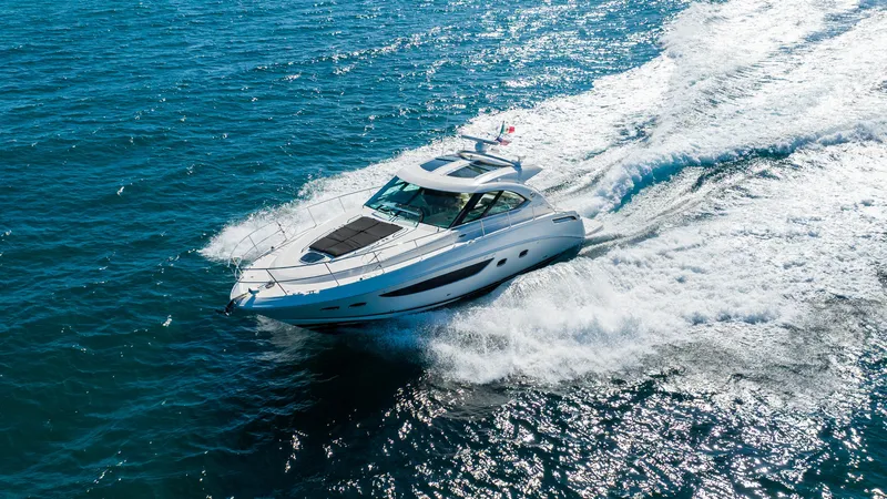 T Yacht Photos Pics 2013 Sea Ray 470 Sundancer cruising on open water.