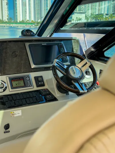 T Yacht Photos Pics Interior helm of 2013 Sea Ray 470 Sundancer yacht with modern navigation equipment.