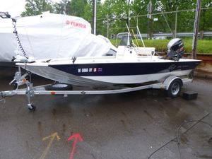 2017 G3 Bay 18 DLX boat on trailer, parked outdoors, with Yamaha engine.