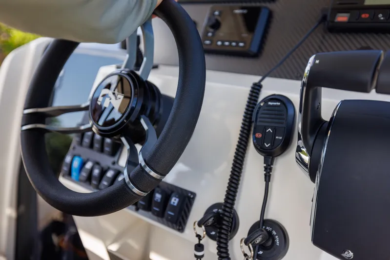 Stock Inventory Yacht Photos Pics 2024 Nuova Jolly Prince 38 boat dashboard with steering wheel and controls.