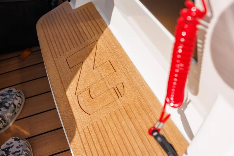 Stock Inventory Yacht Photos Pics Nuova Jolly Prince 38, 2024 model, teak deck detail with red safety cord.