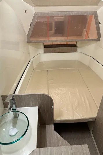 Stock Inventory Yacht Photos Pics 2024 Nuova Jolly Prince 38 cabin interior with bed and modern design.