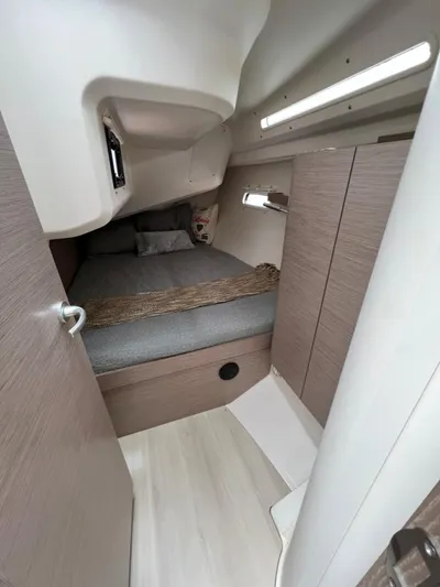 Mdr 388 #305 In Stock Yacht Photos Pics Interior cabin of 2023 Hanse 388 sailboat with modern wood finish.