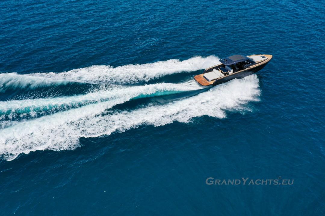 Aerial view of 2025 Focus Forza 37 yacht cruising on blue ocean waters.