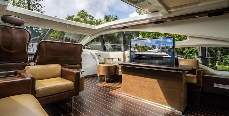 Lunsea Yacht Photos Pics Luxurious interior of 2005 Azimut 68S yacht with leather seating and large windows.