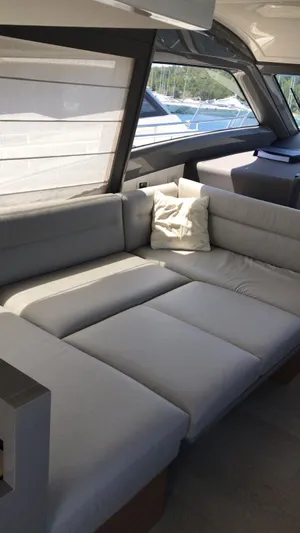  Yacht Photos Pics Luxurious interior of 2020 Ferretti Yachts 450 with plush seating and modern design.