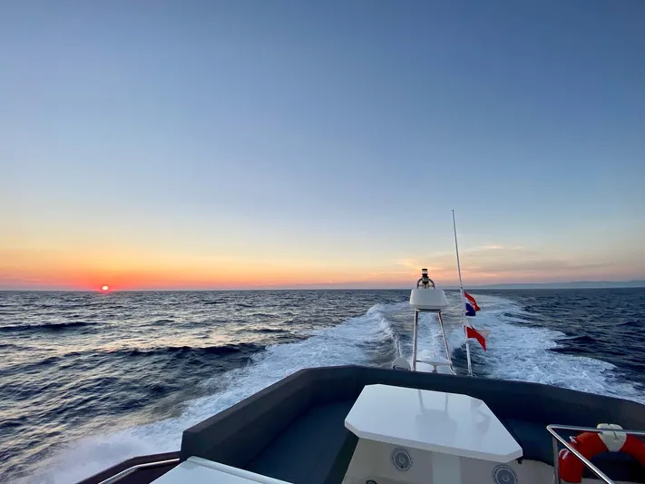 Yacht Photos Pics Ferretti Yachts 450 cruising at sunset, 2020 model, ocean view.