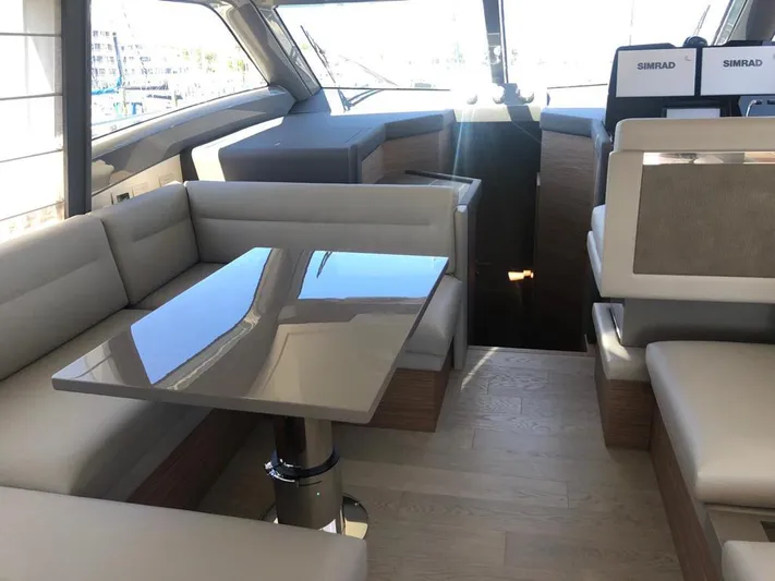  Yacht Photos Pics Luxurious interior of 2020 Ferretti Yachts 450 with modern seating and sleek design.