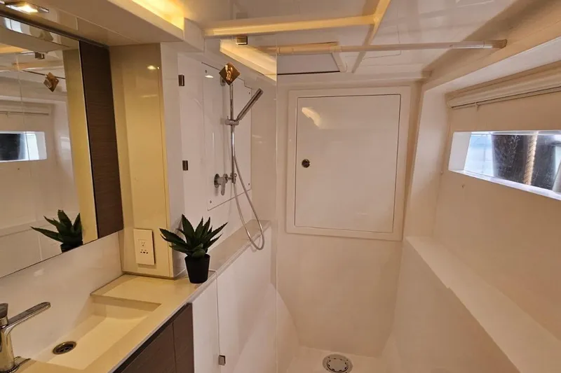  Yacht Photos Pics Modern bathroom interior of 2023 Leopard 40 Powercat yacht, featuring sleek design and fixtures.