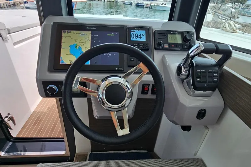  Yacht Photos Pics 2023 Leopard 40 Powercat helm with navigation display and controls.