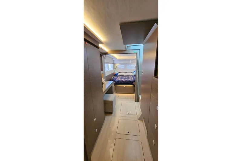  Yacht Photos Pics 2023 Leopard 40 Powercat interior cabin with modern design and cozy sleeping area.