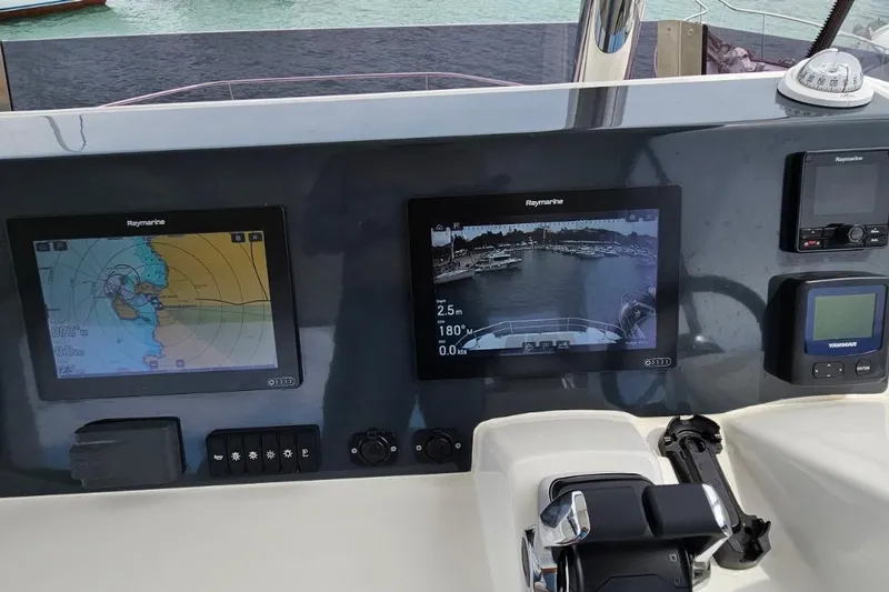  Yacht Photos Pics Control panel of 2023 Leopard 40 Powercat with navigation and monitoring screens.