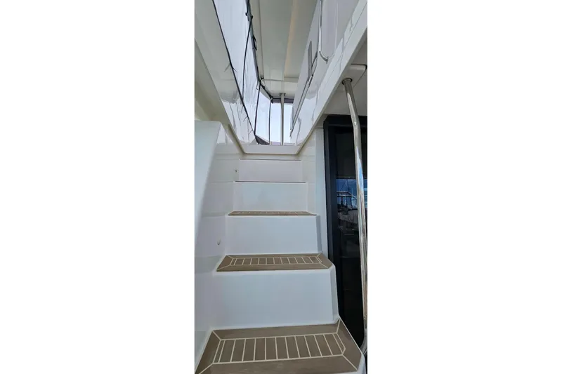 Yacht Photos Pics Staircase on 2023 Leopard 40 Powercat yacht, featuring sleek design and modern materials.