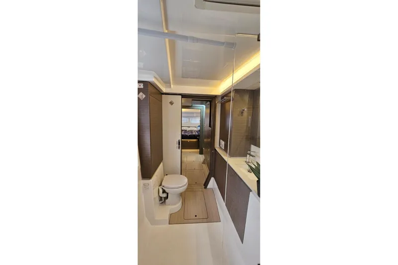  Yacht Photos Pics Luxurious bathroom interior of 2023 Leopard 40 Powercat yacht, featuring modern fixtures and elegant design.