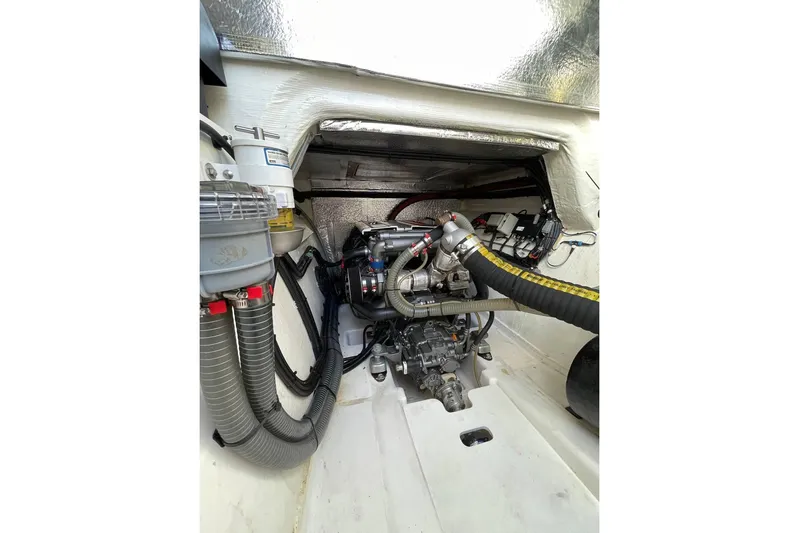  Yacht Photos Pics Engine compartment of 2023 Leopard 40 Powercat, showcasing mechanical components and wiring.