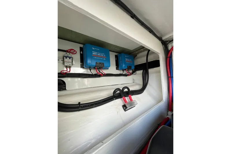  Yacht Photos Pics Electrical system inside 2023 Leopard 40 Powercat, featuring Victron Energy components and wiring.