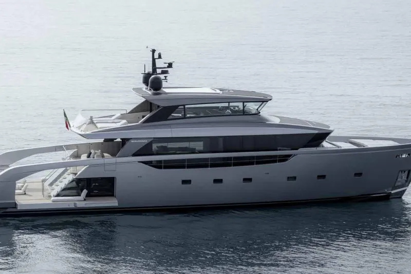  Yacht Photos Pics 2026 Sanlorenzo SX100 yacht on calm water, showcasing sleek modern design.