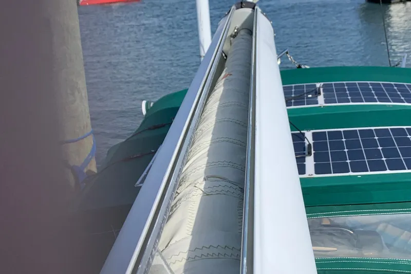 Elation Yacht Photos Pics 2004 Cabo Rico 42 Pilot sailboat with solar panels and rolled sail on deck.