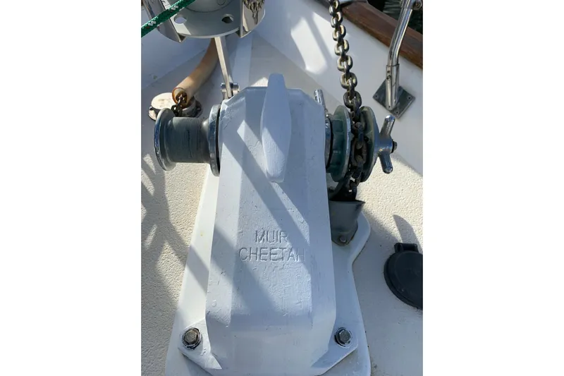 Elation Yacht Photos Pics Windlass on 2004 Cabo Rico 42 Pilot sailboat deck, featuring Muir Cheetah branding.