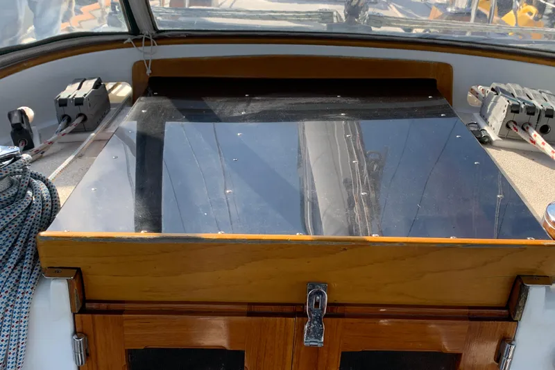 Elation Yacht Photos Pics Cockpit of 2004 Cabo Rico 42 Pilot sailboat with polished wood and control lines.