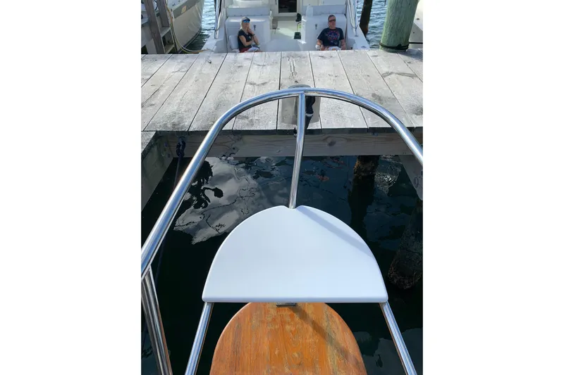 Elation Yacht Photos Pics Bow view of 2004 Cabo Rico 42 Pilot yacht docked at marina.