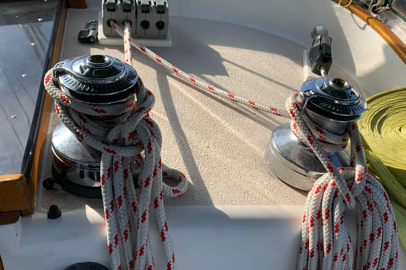 Elation Yacht Photos Pics Winches and ropes on a 2004 Cabo Rico 42 Pilot sailboat deck.
