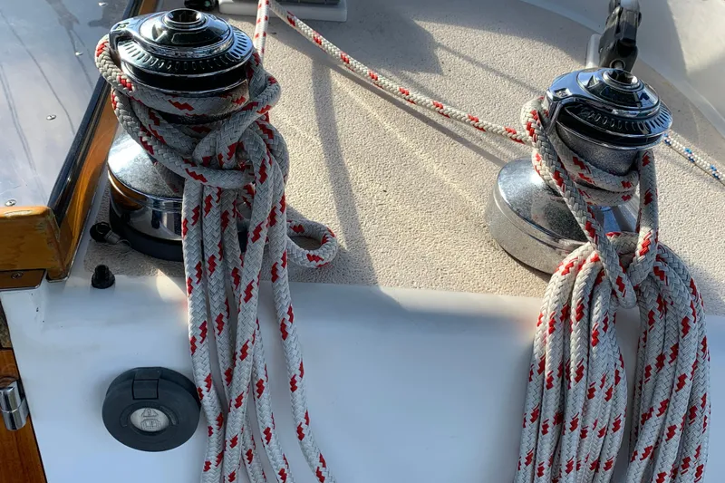 Elation Yacht Photos Pics Winches and ropes on a 2004 Cabo Rico 42 Pilot sailboat deck.