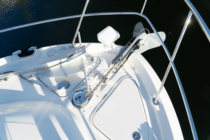  Yacht Photos Pics Bow of 2008 Sea Ray 58 Sedan Bridge yacht with anchor and railing.