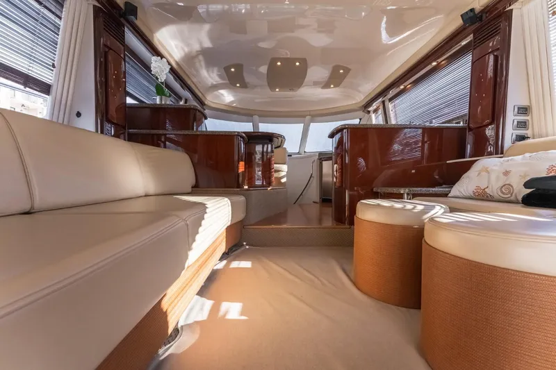  Yacht Photos Pics Luxurious interior of a 2008 Sea Ray 58 Sedan Bridge yacht with elegant seating.