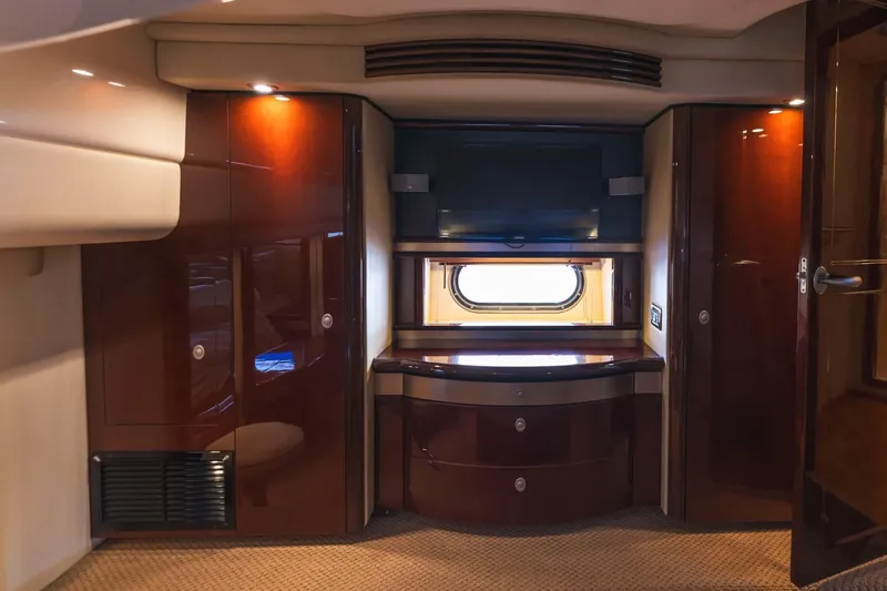  Yacht Photos Pics Luxurious interior of 2008 Sea Ray 58 Sedan Bridge yacht with elegant wood cabinetry.