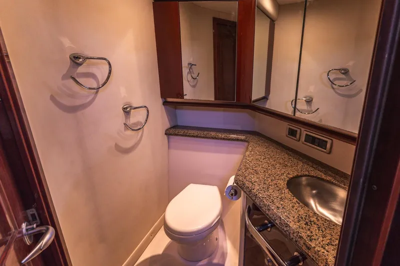  Yacht Photos Pics Luxurious bathroom in 2008 Sea Ray 58 Sedan Bridge yacht with granite countertop.