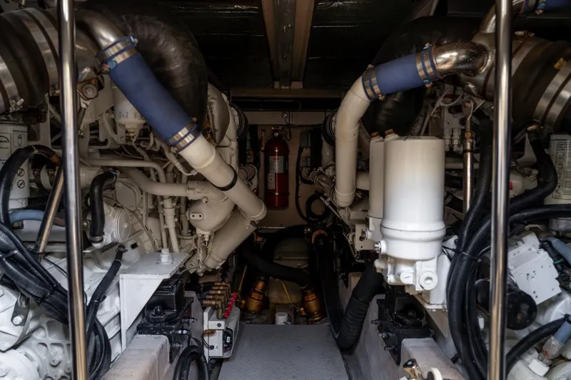  Yacht Photos Pics Engine room of 2008 Sea Ray 58 Sedan Bridge yacht, showcasing complex machinery and components.