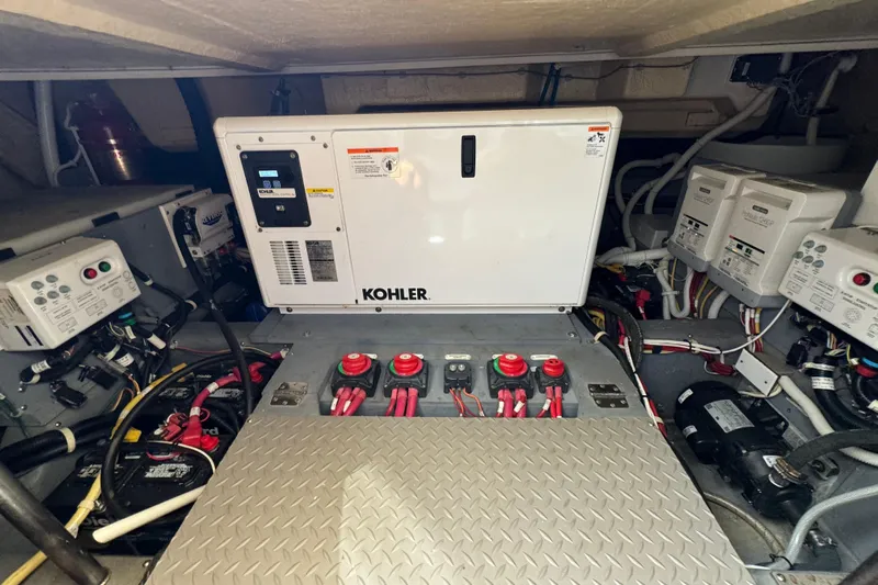  Yacht Photos Pics Engine room of 2017 Carver C40 Command Bridge with Kohler generator and electrical components.