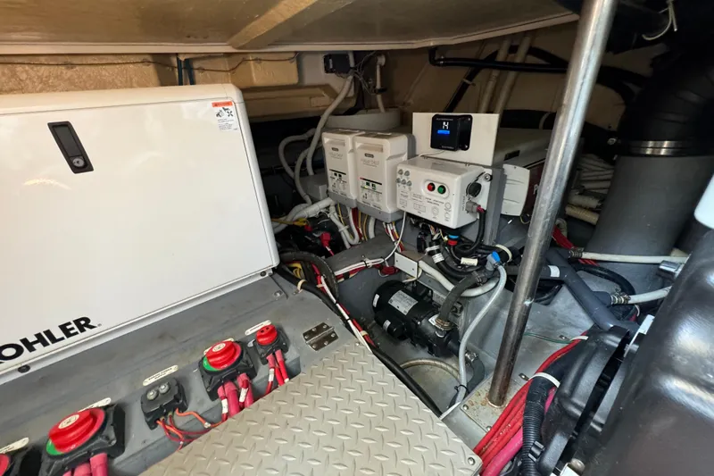  Yacht Photos Pics Engine room of 2017 Carver C40 Command Bridge with Kohler generator and electrical components.