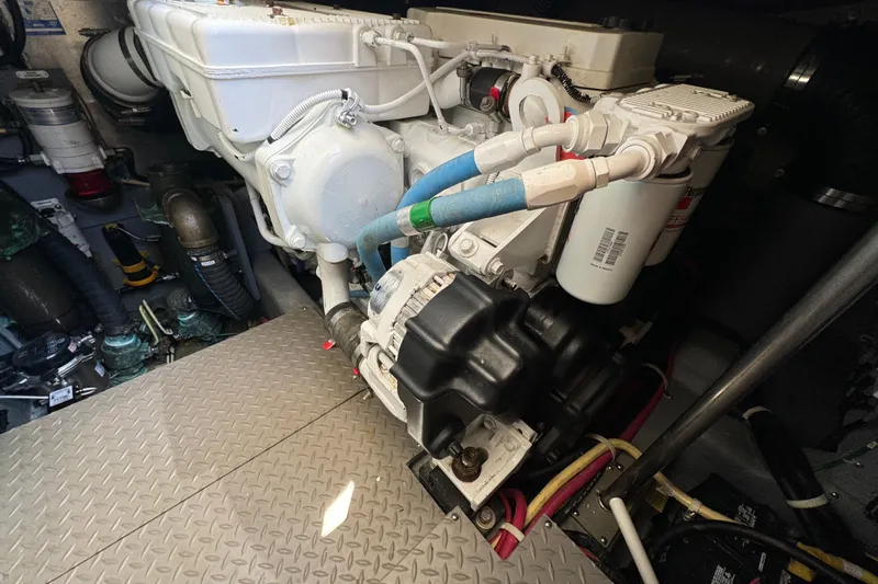  Yacht Photos Pics Engine room of 2017 Carver C40 Command Bridge with visible components and piping.