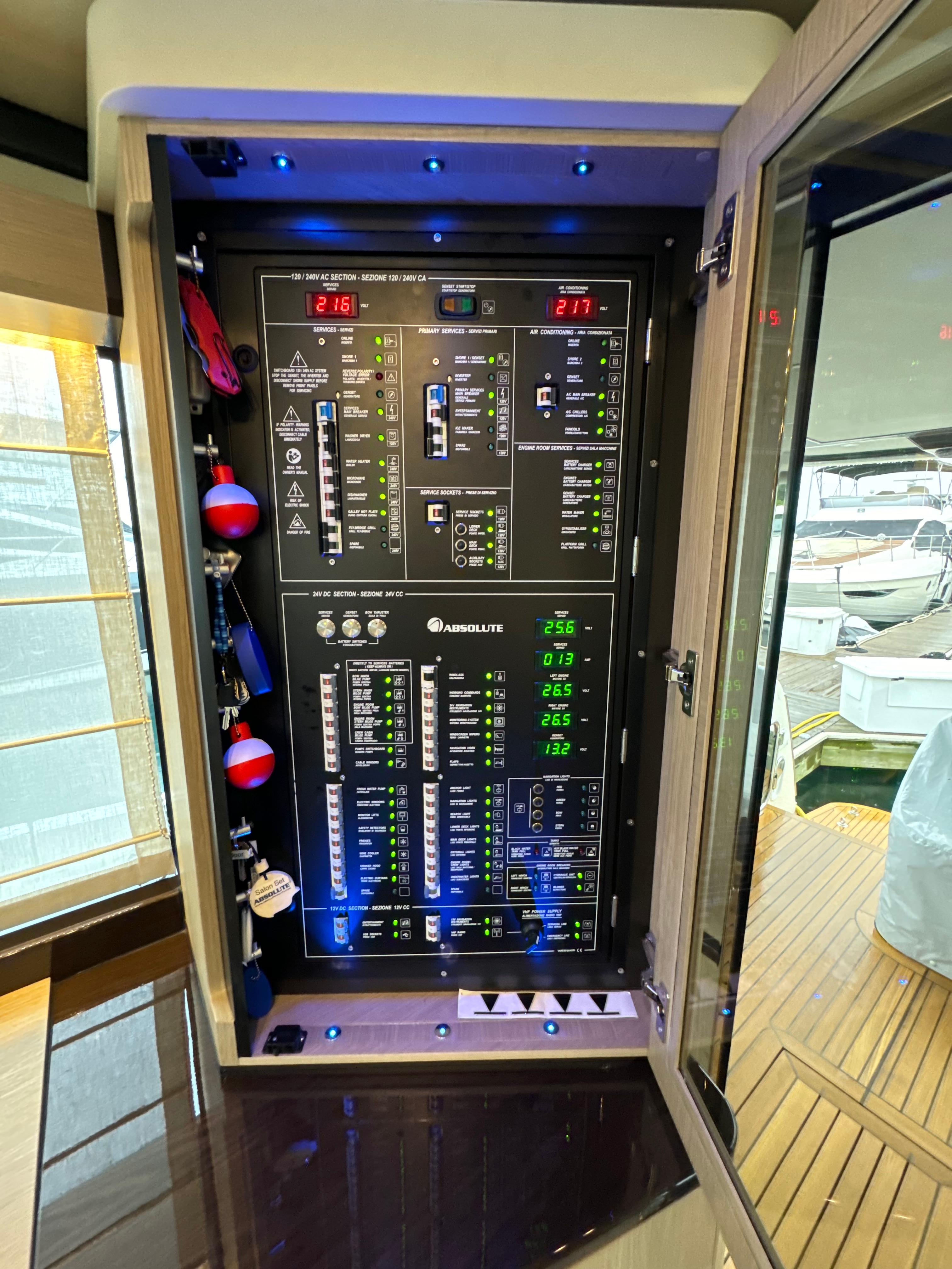 Electrical control panel on 2023 Absolute 52 Navetta yacht, showcasing advanced systems.