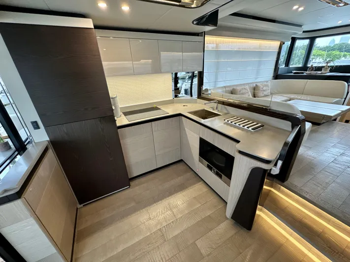 Just You Yacht Photos Pics Luxurious kitchen interior of 2023 Absolute 52 Navetta yacht with modern design.