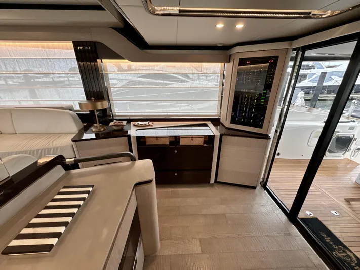 Just You Yacht Photos Pics Luxurious interior of 2023 Absolute 52 Navetta yacht with modern design and elegant furnishings.