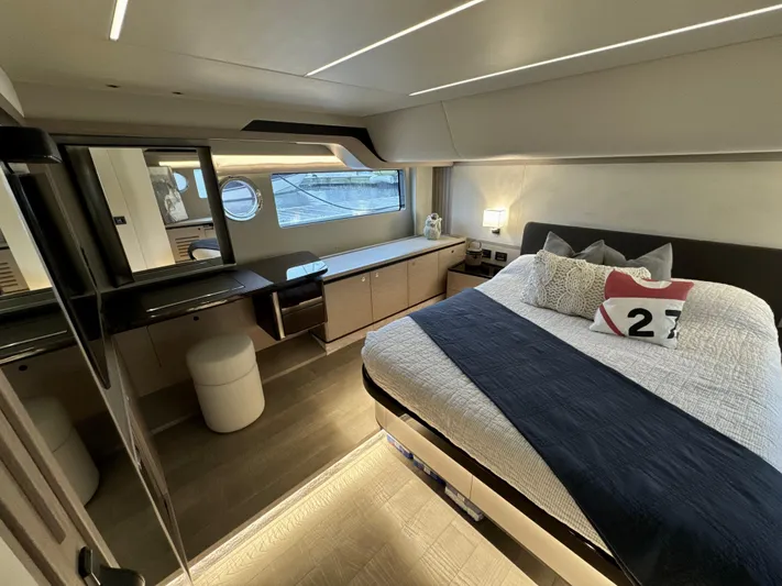 Just You Yacht Photos Pics Luxurious 2023 Absolute 52 Navetta yacht bedroom with modern decor and elegant furnishings.