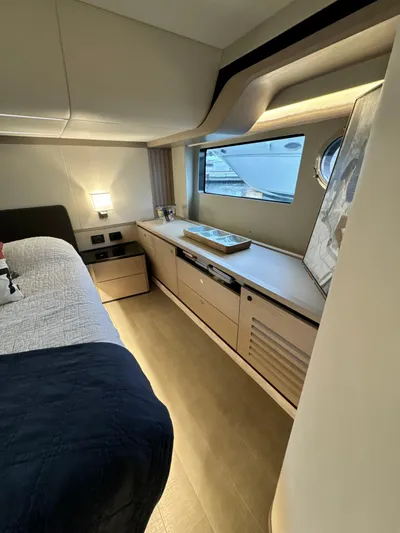 Just You Yacht Photos Pics Luxurious cabin interior of 2023 Absolute 52 Navetta yacht with modern furnishings.